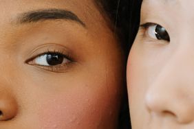 close up of two women with clear skin