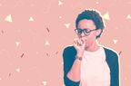 Young beautiful african american woman wearing glasses over isolated background feeling unwell and coughing as symptom for cold or bronchitis. Healthcare concept.