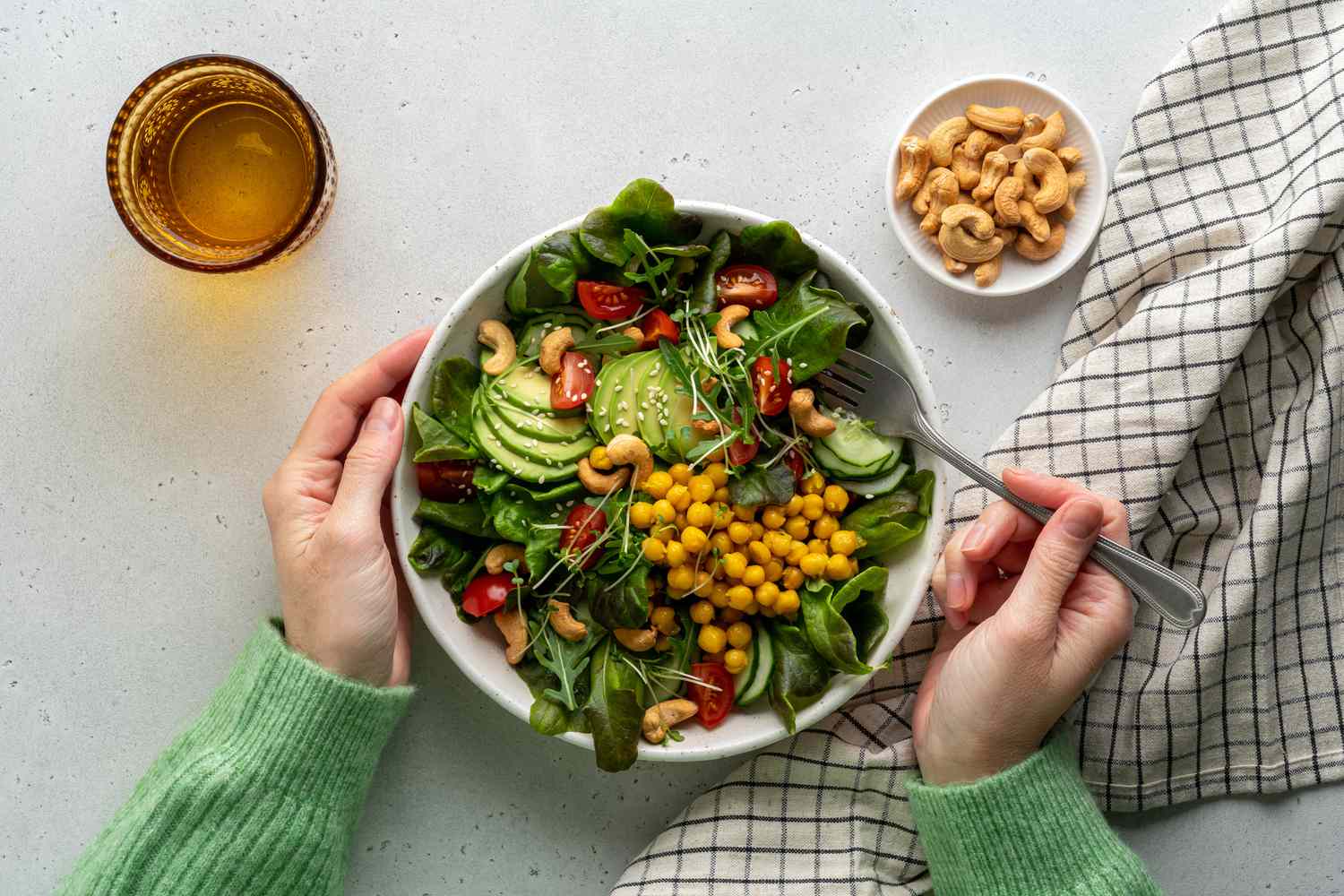 Woman eating vegetarian salad