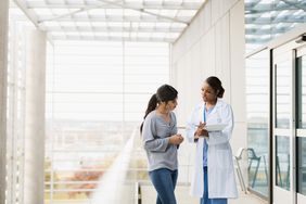 Woman talking to a doctor
