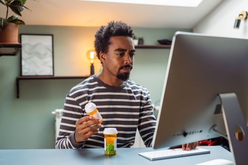 Man researching information about medication