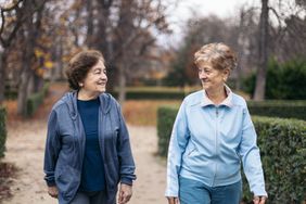 two older women walking outside