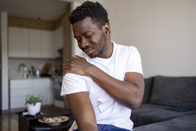 man experiencing muscle pain due to vitamin d deficiency 